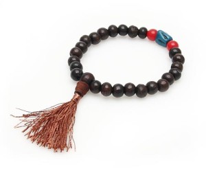Handmala, Holz, dunkelbraun, Steine