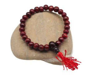 Handmala, mittelbraun, aus Holz